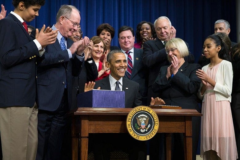 Obama signs education law rewrite shifting power to states