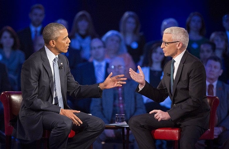 Obama bids for backing on gun orders, rips NRA