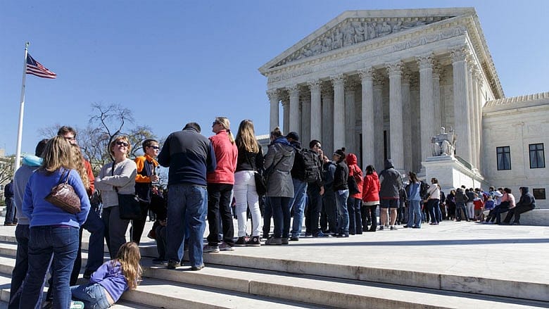Tied 4-4 after Scalia’s death, high court gives unions a win