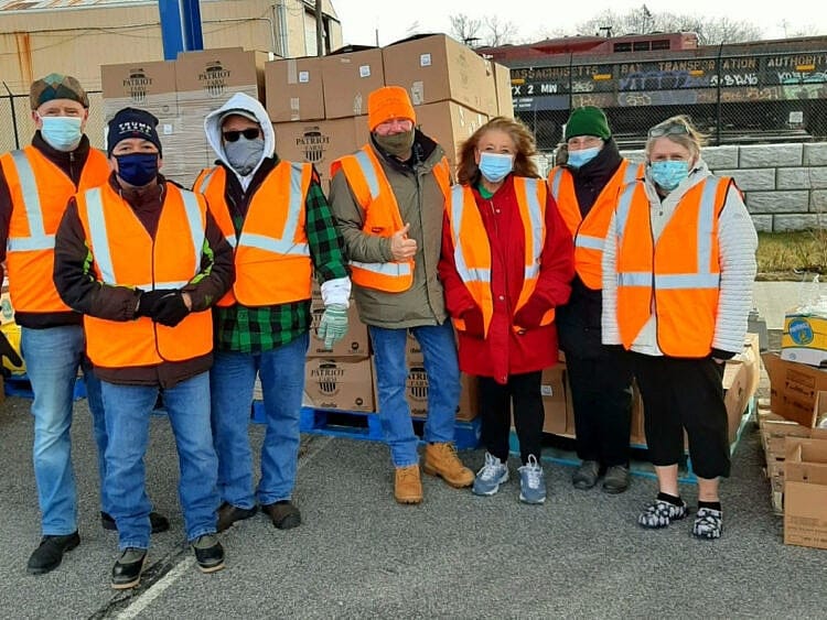 United Cape Patriots Giving Back By Volunteering To Distribute Food To Veterans