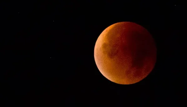 Stargazers witness rare event in supermoon eclipse