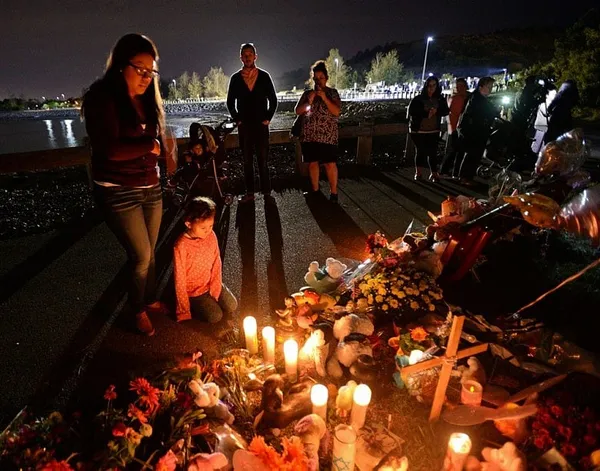 In a donated dress, girl dubbed Baby Doe is buried