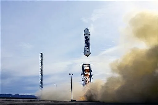 Amazon founder Bezos marks a space milestone