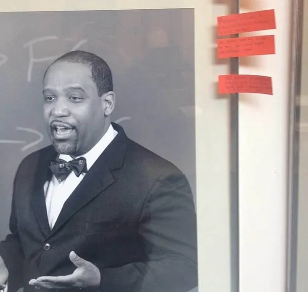 Tape defaces black professors’ Harvard Law portraits