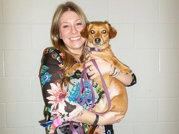 Dogs bring joy to nursing homes through volunteers