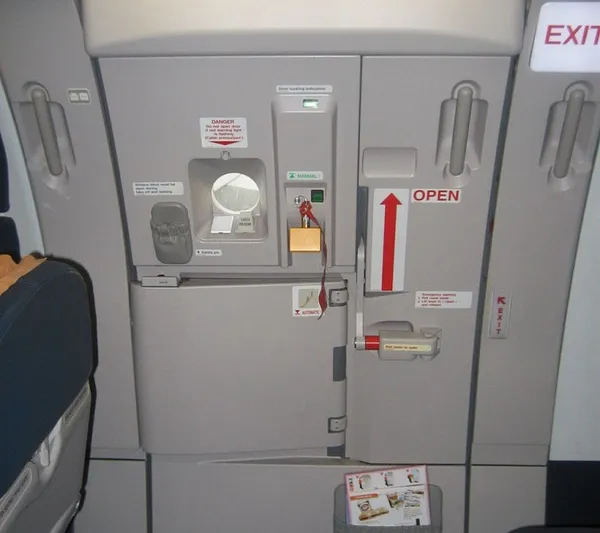 Cops: Drunk woman tried to open UK-to-Boston jet’s exit door