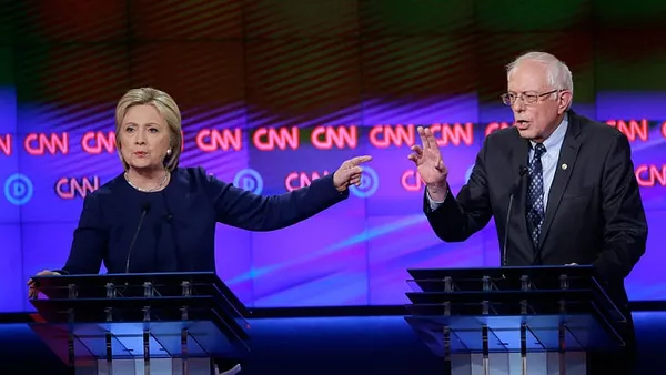Clinton, Sanders tangle on economy in debate