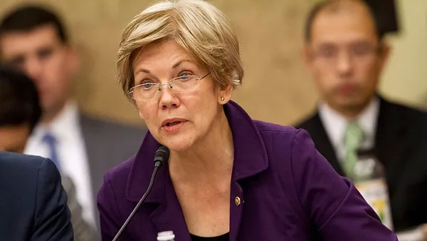 Warren gets in step with Clinton campaign