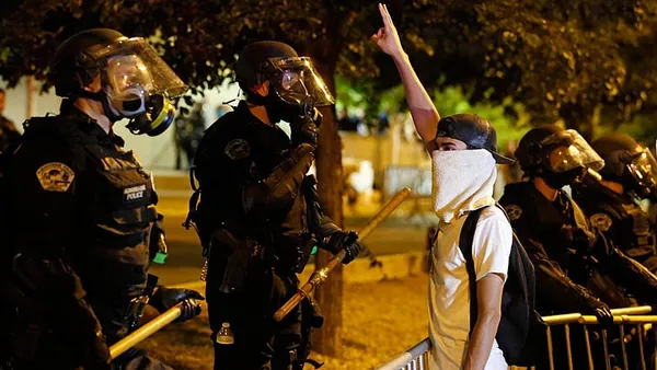 Protests turn violent outside Trump rally in New Mexico