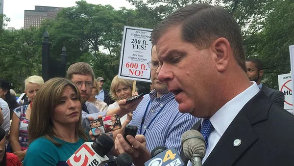 Walsh reacts as second top aide faces extortion charges