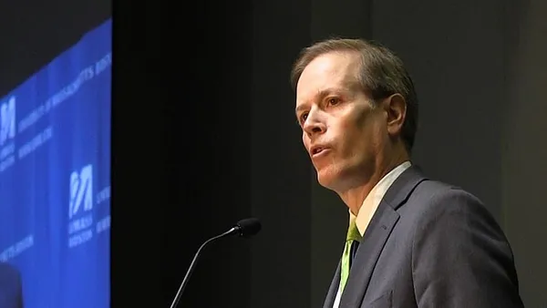 Education secretary gets raucous reception at UMass