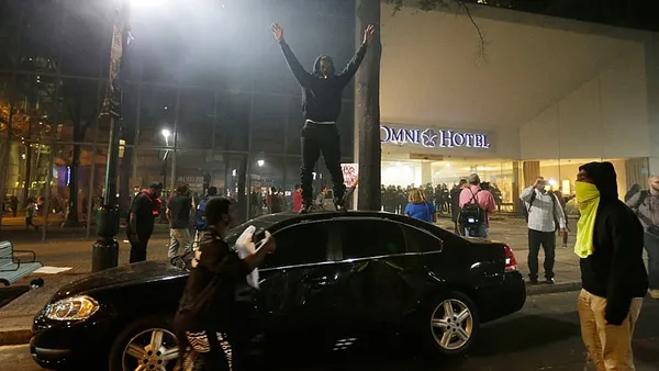 State of emergency in Charlotte, as protesters rampage and loot