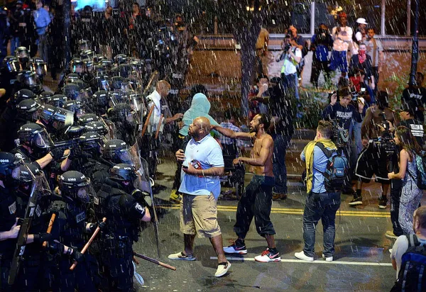 Growing number of race riots leaves dark mark on Obama legacy
