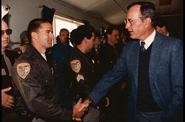 Comedian Recalls Police Details Outside Bush Compound