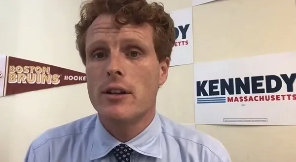 Joe Kennedy III Displays Bruins Pennant During Online Appearance