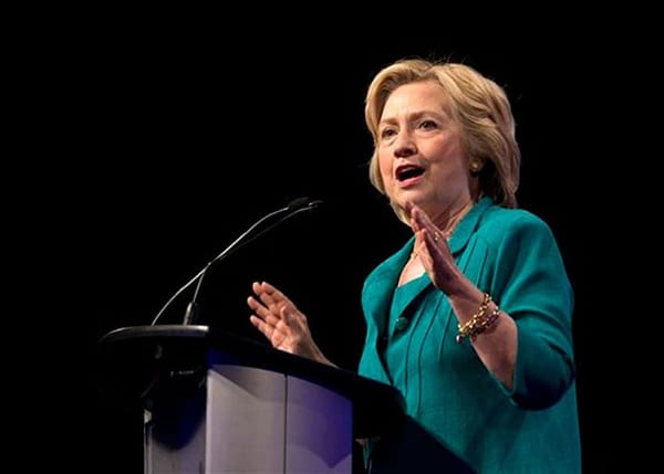 Clinton calls for Cuba embargo’s end