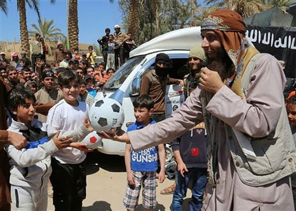ISIS trains kids to behead dolls