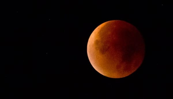 Stargazers witness rare event in supermoon eclipse