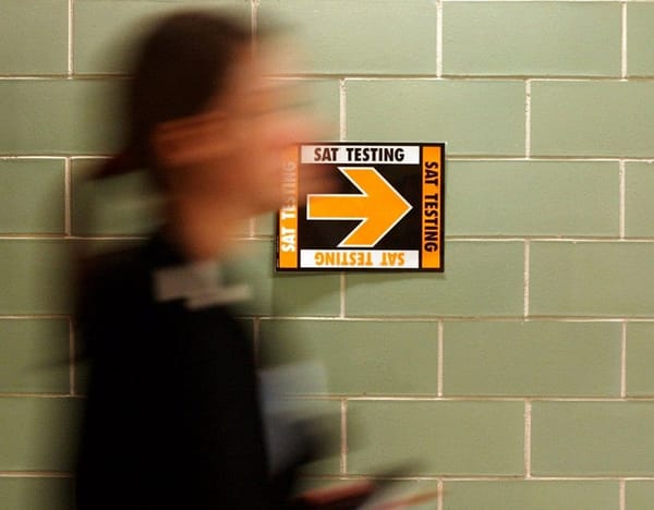 SAT scores slip slightly; more students take test