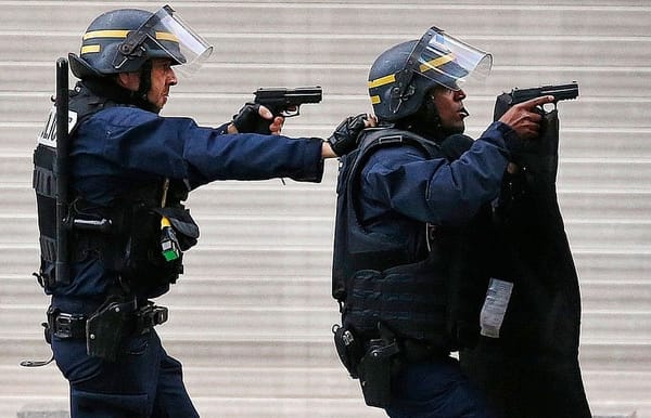 2 dead, 7 arrested in raid targeting Paris attack mastermind