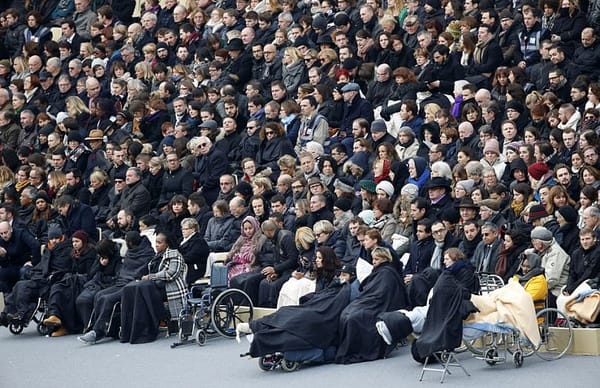 France honors attack victims in city subdued by mourning