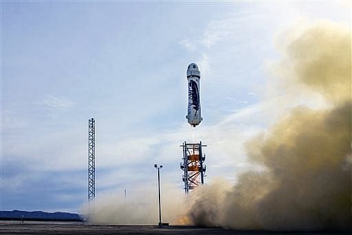 Amazon founder Bezos marks a space milestone
