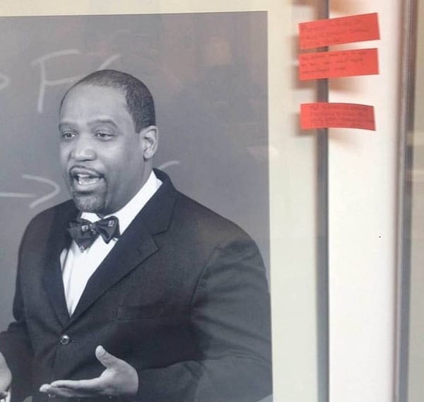 Tape defaces black professors’ Harvard Law portraits