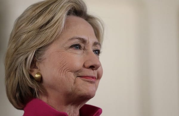 Hundreds of old Clinton emails newly classified