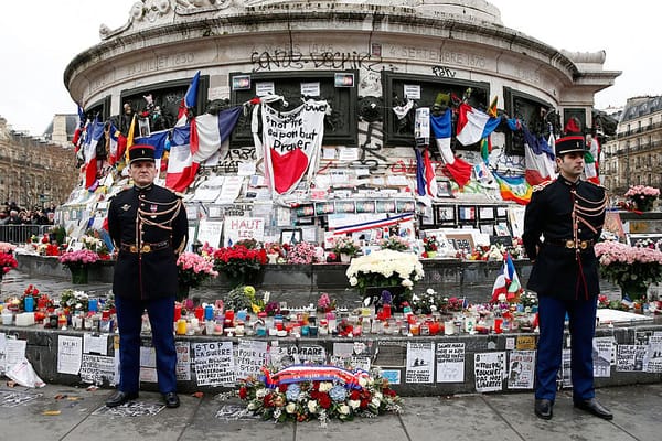 French president, rocker honor 2015 attack victims