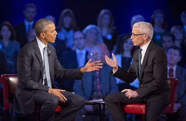 Obama bids for backing on gun orders, rips NRA