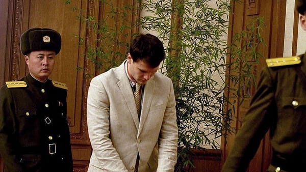 North Korea puts tearful detained American before cameras