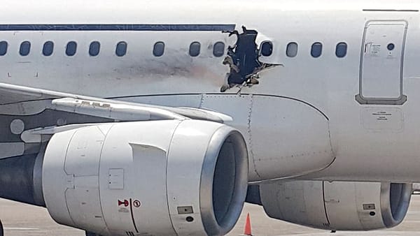 Somalia spokesman: Video shows laptop handed to bomb suspect