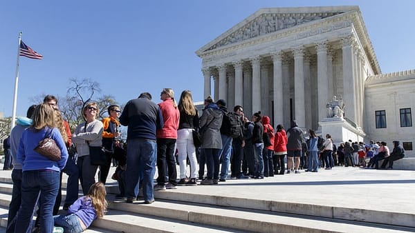 Tied 4-4 after Scalia’s death, high court gives unions a win