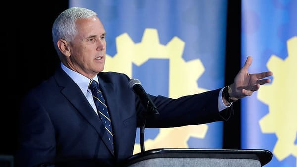 With Pence a favorite, Trump postpones naming running mate