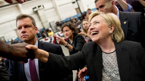 Clinton goes on offense trying to win over GOP